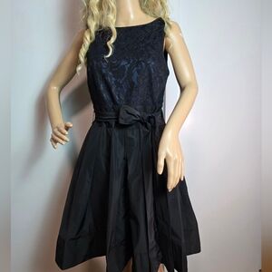 Frank Lyman Black & Navy Floral Lace Cocktail Dress with Taffeta Skirt & Bow Det